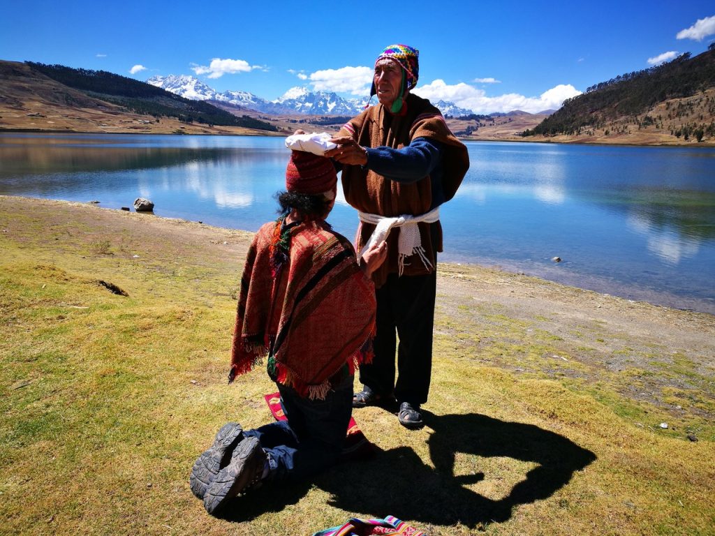 A Shaman Ritual travellers will see in Peru when visiting a local community, which can be organised by a tour operator