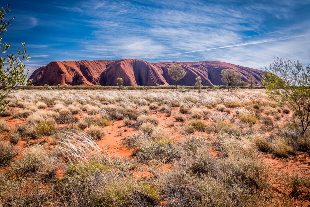 The impressive view of Uluru, a visit can be organised by tour operator Antipodes Travel