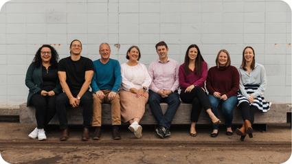 Members of the Tourwriter team sitting together